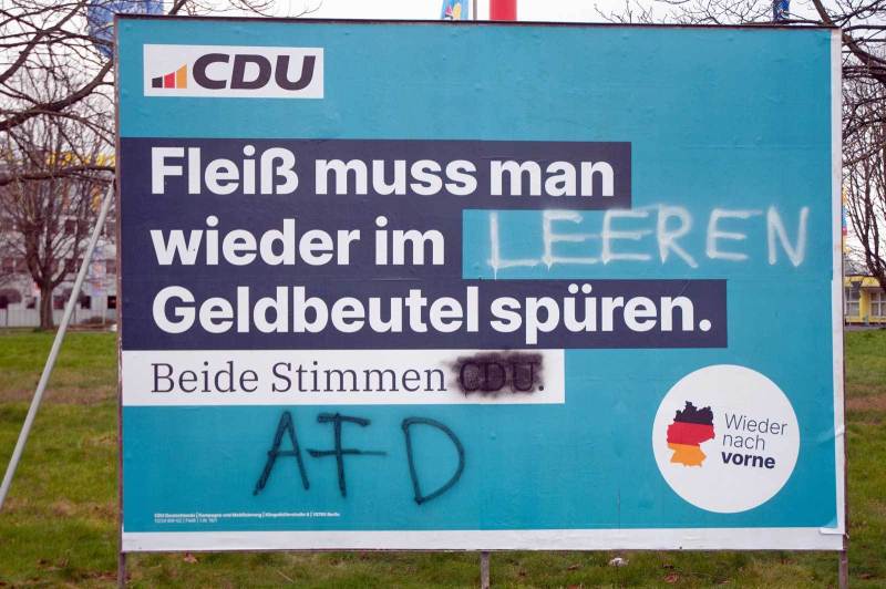 CDU-Plakat mit AfD-Pöbeleien