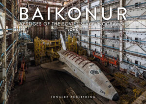 The Baikonur Cosmodrome in Kazakhstan was created by the Soviets in the 1950s. It was from Baikonur in 1988 that the first Soviet spaceplane, Buran, was launched, in response to the United States Space Shuttle.  The Buran programme would officially end in 1993 during the presidency of Boris Yeltsin, with only one Buran launch ever taking place — in 1988. Thereafter, parts of the Baikonur Cosmodrome fell into disuse, notably the sites connected with the launch of these Soviet craft. The two shuttles that were completed remain abandoned there,  laid to rest in this atmospheric place. This is the first time that photographs of these spectacular locations have been published in a book. Jonk travelled 20km through the Kazakh desert under cover of night, entered the hangars clandestinely, and spent three nights there under the radar of military security to produce a truly incredible photographic reportage of what is considered today the world’s most important urban exploration site. Jonk reveals to us his excellent collection of photographs taken in the disused part of the Baikonur Cosmodrome. As well as providing us with these amazing pictures, he describes for us the incredible adventure of visiting a location that is unique in the world.