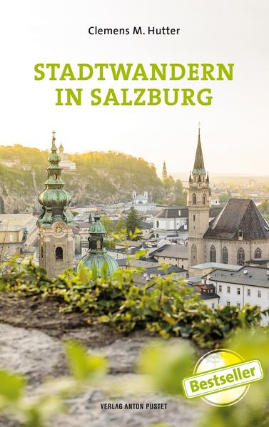 Salzburg neu entdeckt: Das neue „Stadtwandern“ lässt uns Salzburg von einer anderen Seite kennenlernen und bietet 28 entschleunigte Spaziergänge durch die Stadt, um zu schauen und zu staunen. Clemens M. Hutter weiß über unzählige Details und Kuriositäten zu berichten, die auch vielen Salzburgern nicht bekannt sein dürften: Oder wussten Sie, warum aus einer sumpfigen Au der Volksgarten entstand, dass im Zwerglgarten gar keine Zwerge stehen, dass es in Maxglan die Stadtlandschaft „Balkonien“ gibt, welcher Zusammenhang zwischen den Hochwassermarken in der Altstadt und den Kaivillen am rechten Salzachufer besteht und warum die 1940 abgebaute „gelbe Elektrische“ umgangssprachlich „rasende Eierspeis“ genannt wurde. Ein Spaziergang durch zwei Jahrtausende, auf dem man sowohl den historischen Spuren von Hexenwahn und Naziterror folgen oder sich in der Stadt beim Klettern oder Surfen im Almkanal üben kann. In diesem Sinne: Die Erde ist rund, aber Salzburg ist eben doch mehr als eine Mozartkugel!