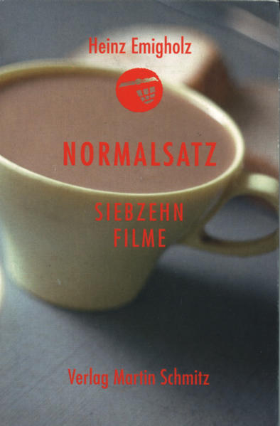 Filmtexte, Essays, Zeichnungen, Notizhefte, Plakate, Standbilder, Interviews, Filmografie, Chronologie, Legenden, Texte von Ronald Balczuweit, Marcia Bronstein, Heinz Emigholz, Ueli Etter, Frieda Grafe, D. Holland-Moritz, Hans Hurch, Bettina Klix, Wolfgang Müller, Uwe Nettelbeck, Kiev Stingl, Sebastian Weber. Normalsatz ist ein Buch der Fakten. Zu den siebzehn bisher veröffentlichten Filmen von Heinz Emigholz werden Informationen und Texte geliefert, die den Zusammenhang einer filmischen Arbeit verdeutlichen. So unterschiedlich die Filme sind, sie lassen sich vielfach miteinander in Beziehung setzen. Die Arbeiten der beteiligten Autoren spiegeln diese Möglichkeiten wieder. Das Buch Normalsatz ist als Werkzeugkasten für weitere Überlegungen gedacht und stellt die Filme in chronologischer Abfolge vor. Von „Schenec Tady“ 1973 bis „Der Zynische Körper“ aus dem Jahr 1991, nebst einem Ausblick auf das laufende Projekt „Photographie und jenseits“, das den Filmemacher noch weitere 25 Jahre beschäftigen wird. Zu jedem Film werden detailierte Angaben in Wort und Bild geboten, bis zur Transkription der gesprochenen Filmtexte der vier Spielfilme, die im Buch wie Theaterstücke erscheinen.