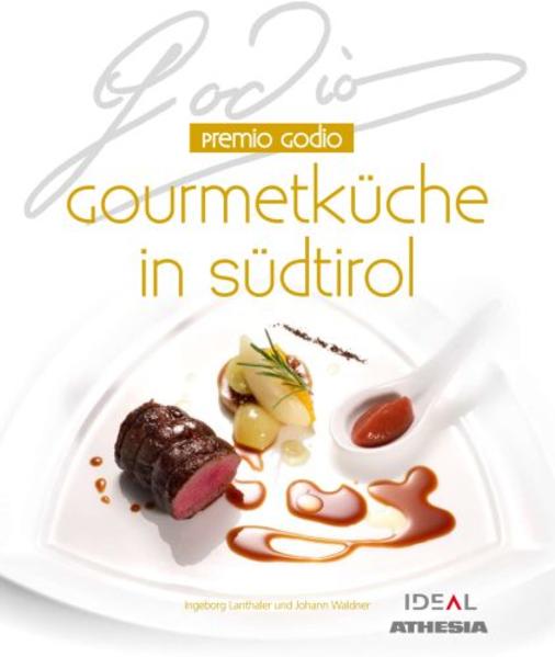 "Premio Godio. Gourmetküche in Südtirol“ ist ein Rezeptbildband mit feinen Rezepten und erlesener Koch- und Kultur-Raffinesse. Einige Rezepte von einem der "Ziehväter" der neuen Gourmetküche Südtirols, Giancarlo Godio, werden darin interpretiert. Premio Godio-Preisträgern wird in die Küche geschaut. Daraus sind lebendige und sehr persönliche Charakterbilder entstanden, die etwas von den Kunstfertigkeiten und der Kreativität von Spitzenköchen erahnen lassen. Star-Koch Heinz Winkler erinnert sich an Giancarlo Godio und vervollständigt mit einem eigenen Rezept das Mosaik innovativer Kochkunst. So wird die Neuerscheinung "Premio Godio. Gourmetküche in Südtirol" zu einem Buch für alle Sinne, voller Geschmack für Auge und Gaumen, ein Buch puren Lebensgenusses, großer Kunst und Festlichkeit. Es handelt sich um einen reich bebilderten Band, der die Ästhetik der Kochkunst und die Leidenschaft für die Rohstoffe vermittelt. Der Duft des "Latschenöls" und die Knusprigkeit des Zimtcroutons sollen beim Durchblättern wahrgenommen werden. "Premio Godio. Gourmetküche in Südtirol" ist ein neuer Ansatz, die hochwertige Küche kreativer Köpfe zu zeigen und Lust auf Spitzengastronomie zu bereiten, die ihren festen Platz in der globalisierten Geschmacksküche einnimmt.